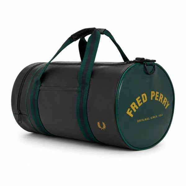 Fred Perry Classic Barrel Bag in navy with green ends, gold logo, and striped straps.