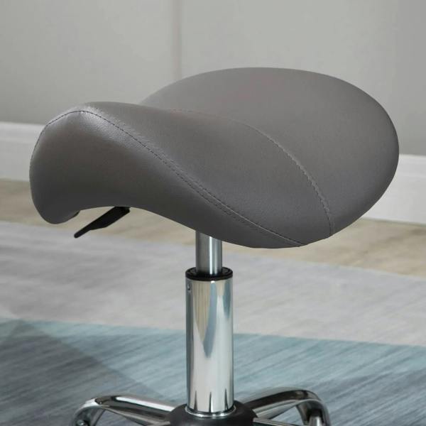 Grey curved saddle seat on chrome pedestal with rolling base for mobility