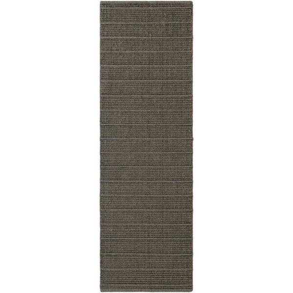 Dark gray woven runner rug on a white background