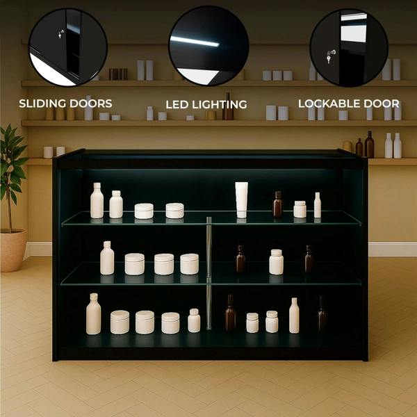 Black LED retail shop counter K1500 with sliding doors, lockable design, and illuminated shelves displaying various products