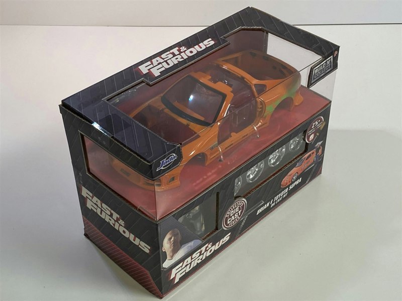 a toy car in a box
