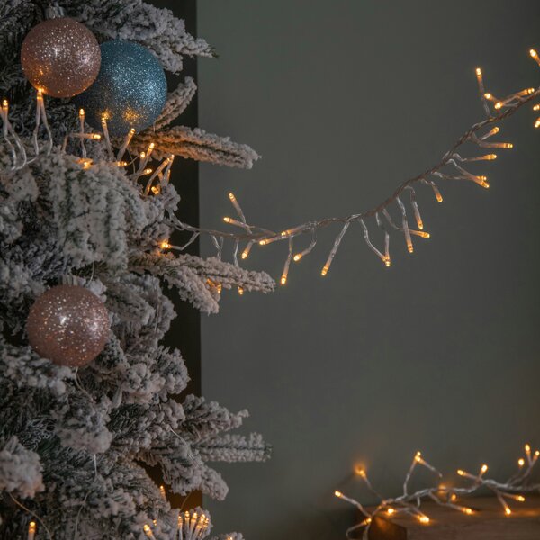 Samuel Alexander 9.3m 720 LED Christmas Cluster String Lights with Timer in Vintage Gold on Clear Cable