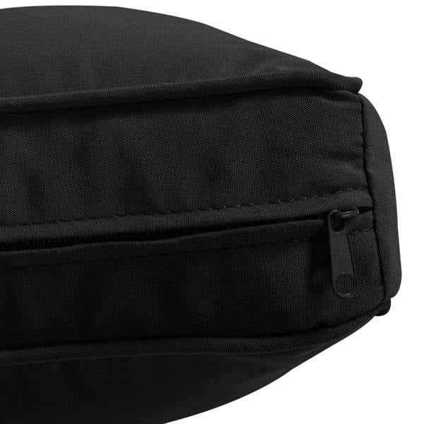 Black cushion cover corner with zipper pull and reinforced stitched seams