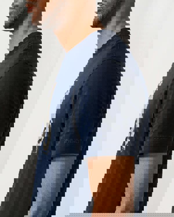 back shot of a model wearing a Moose Knuckles Tandem Mens T-Shirt in Navy 833