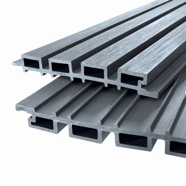 WPC slatted wall cladding panels in grey, featuring a sleek, textured surface and hollow rectangular profiles for easy installation