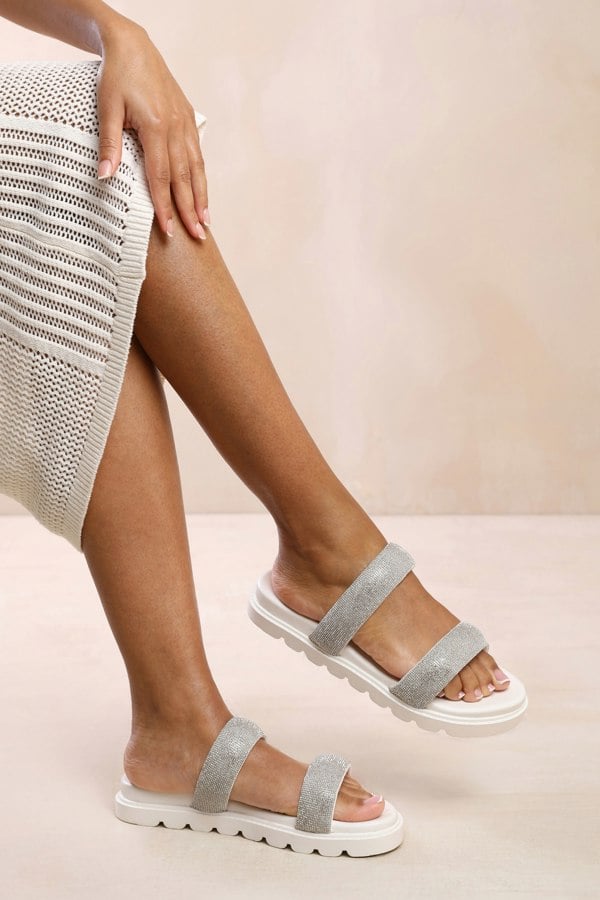 Where's That From Caitlyn Flat Sandal With Clear Diamond Strap in White Pu
