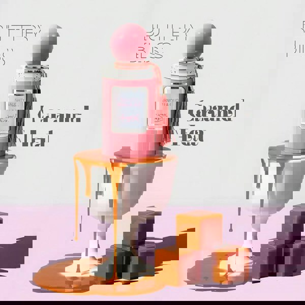 Sapil Naughty Vanilla Oud Unisex EDP 100ml Pink perfume bottle with caramel elements on a pink background