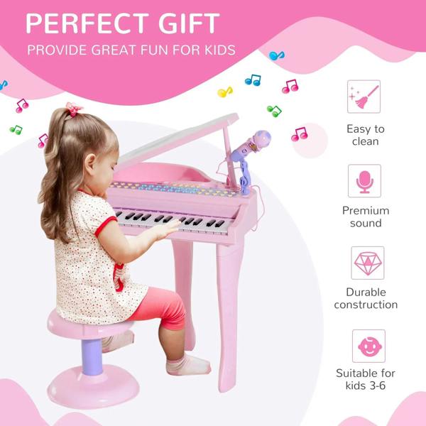 Pink kids electronic keyboard with microphone and colorful play panel