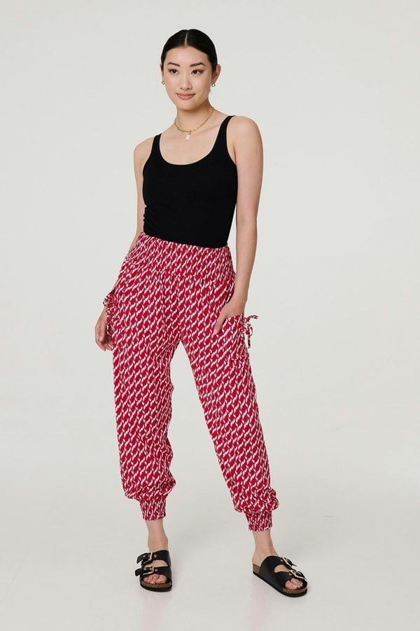 Red | Printed Tapered Harem Trousers