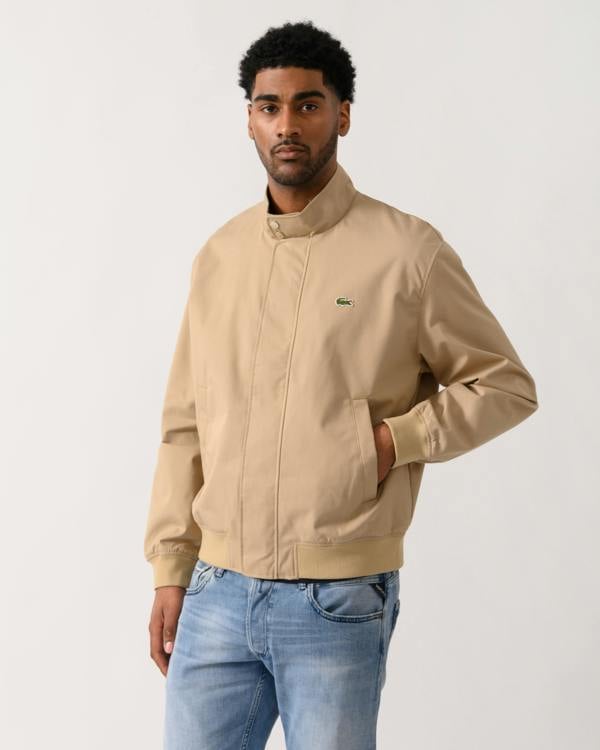 Model wearing a Lacoste Lightweight Water-Repellent Twill Mens Harrington Jacket in Viennese 02S