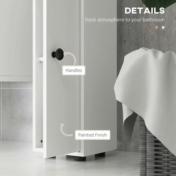 White bathroom cabinet detail: black knobs, side handle, and painted finish.