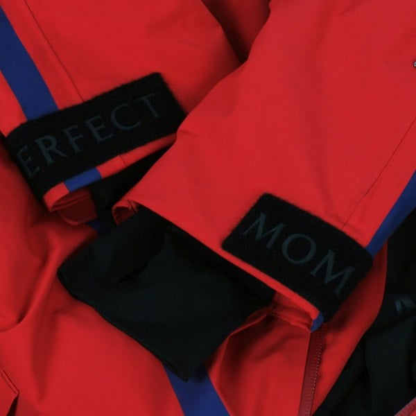 Perfect Moment ski suit in red with navy blue detailing
