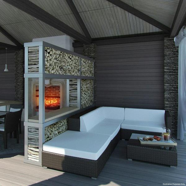 Jardí Composite Decking in Castle Grey, featuring a textured finish, complements a modern outdoor lounge with a cozy fireplace