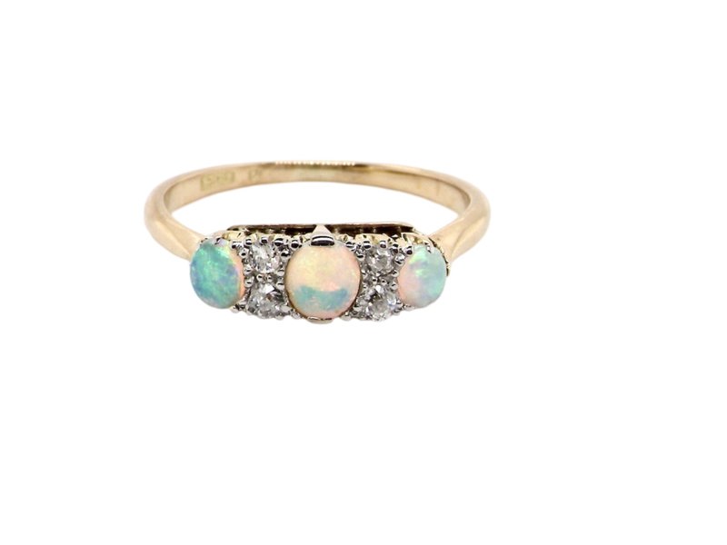 A vintage opal and diamond ring