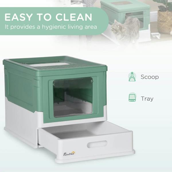 Green hooded cat litter box showing scoop and removable tray for cleaning