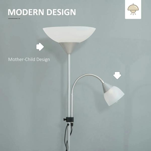 Silver floor lamp with wide bowl top shade and curved adjustable arm holding a side spotlight.