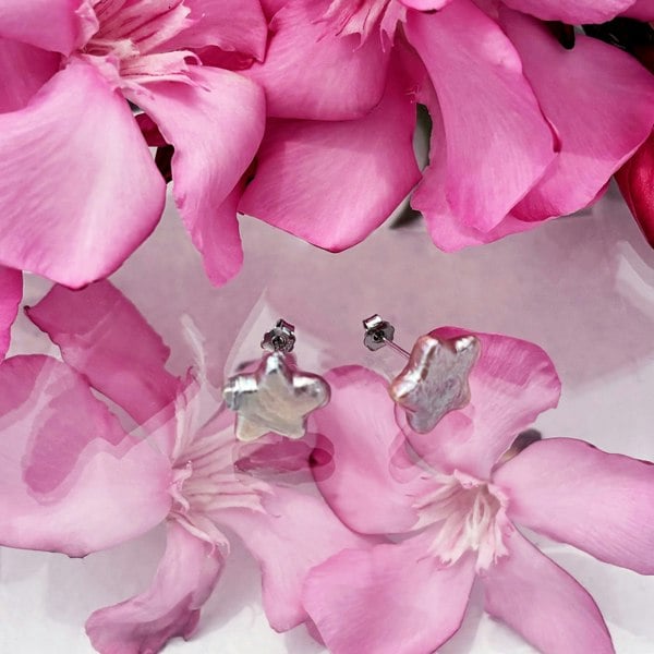 Pink star studs by LENAE London handcrafted with star pearls.