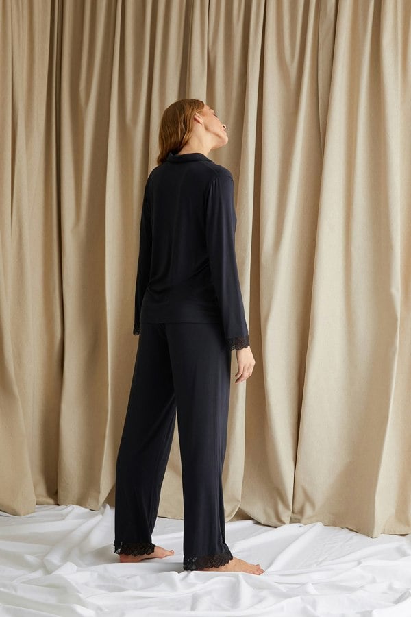 Women's Bamboo Lace Long Pyjama Set in Raven with delicate lace trims, iridescent tonal buttons and revere collar finished with tonal piping from Pretty You London