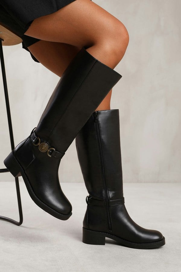 Where's That From Washington Below Knee Boot With Gold Buckle Detail in Black Faux Leather