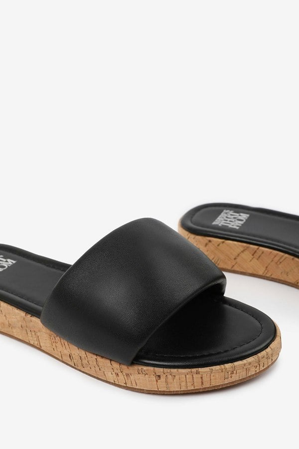 Where's That From Julia Wide Fit Flatform Sliders Sandal In Black Faux Leather