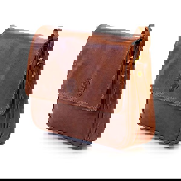 brown leather bag, closed up view to show detailed stitching and buttery soft leather.