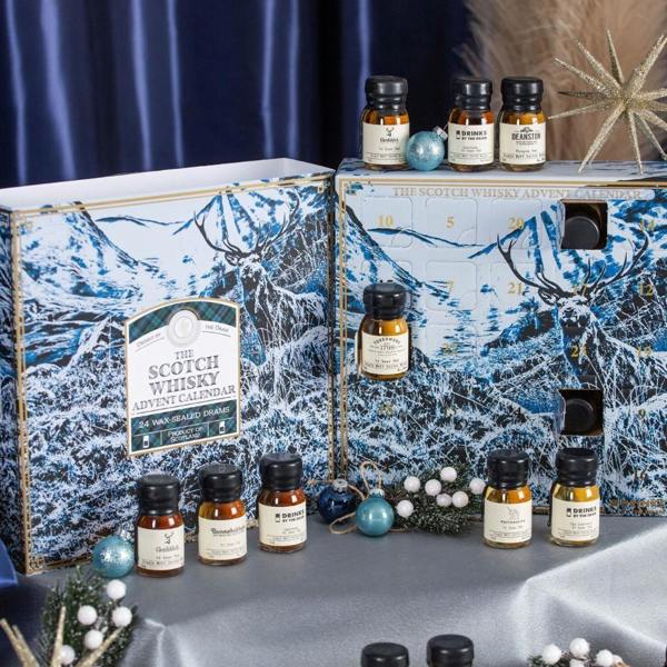 The Scotch Whisky 2026 Advent Calendar opened up to reveal numbered doors and wax-sealed miniature dram bottles.