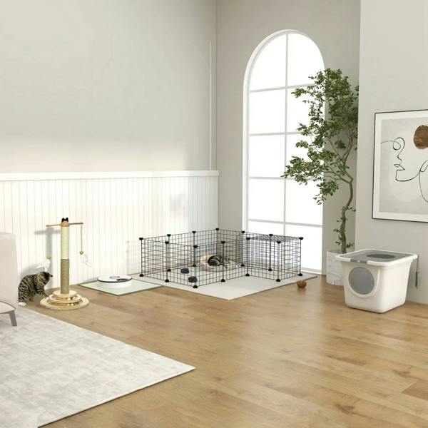 Black metal wire playpen enclosure in a room with small animals inside