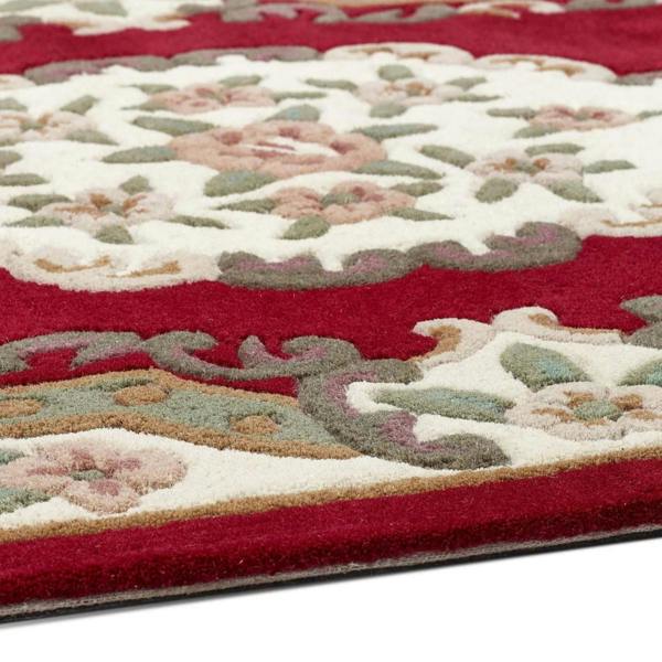 Close-up of a red and patterned rug