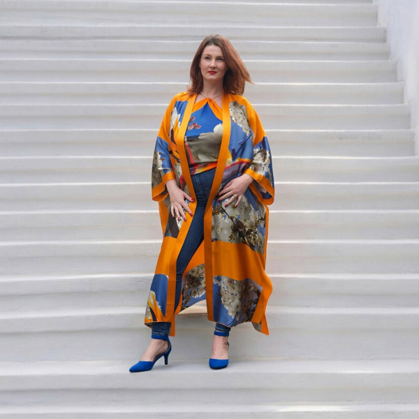 Bird of Paradise White Blue Cherry Blossom Silk Kimono paired with a Cherry Blossom Silk Scarf, as a top, featuring elegant cherry blossom patterns and vibrant colors. White Steps Background.