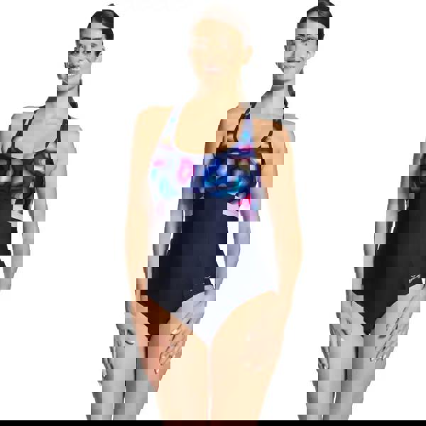 Zoggs Zephyr Dakota printed crossback swimsuit in navy blue with colorful abstract print