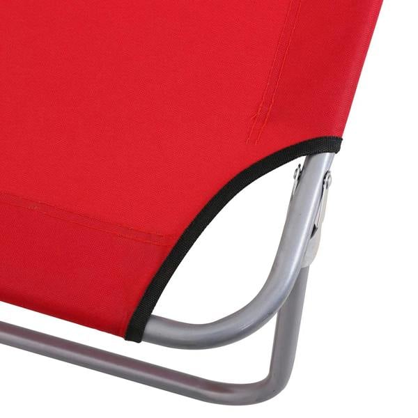 Red lounger cushion close-up with black trim and curved silver steel leg