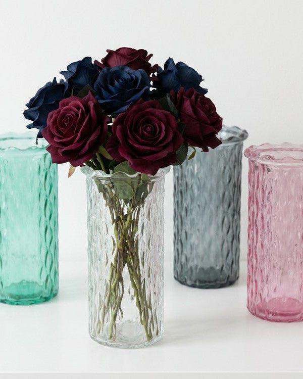 set of 4 glass vases in clear, grey, green and pink