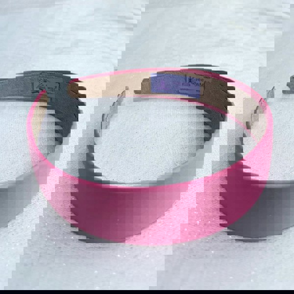 Pink hairband, smooth satin finish, soft padded design, bright pink colour, classic everyday accessory, stylish minimalist headband
