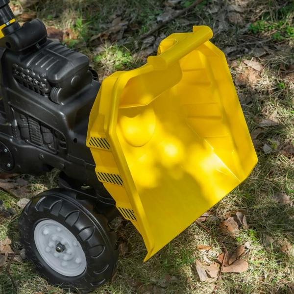 Close-up of yellow front bucket on a kids ride-on tractor go-kart
