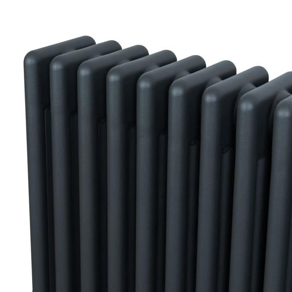 Traditional anthracite 4 column radiator with a sleek, modern design, featuring smooth, rounded edges and a textured finish