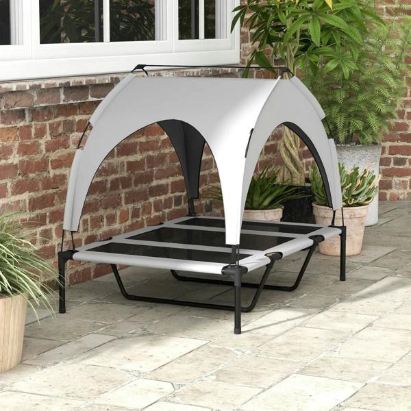 Light grey raised dog bed with canopy and black frame, breathable mesh platform