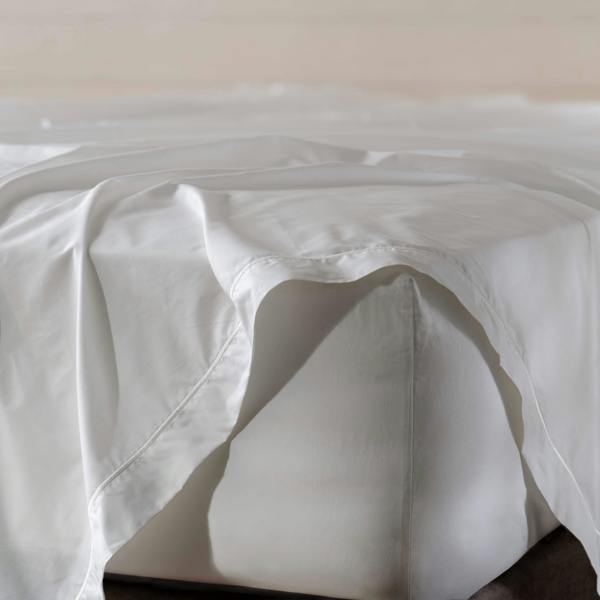 White 500 Thread Count Egyptian Cotton Flat Sheet styled in a bedroom | Soak and Sleep