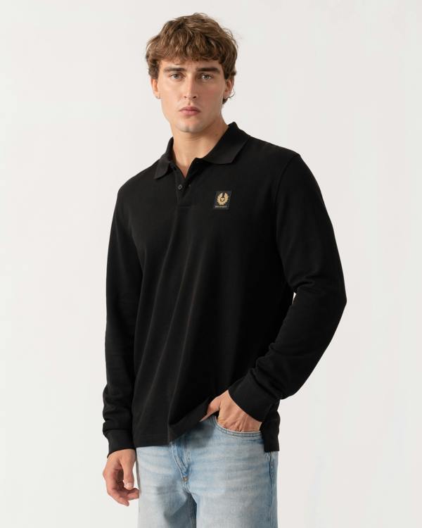 Man wearing Belstaff Mens Long Sleeved Logo Polo - Black