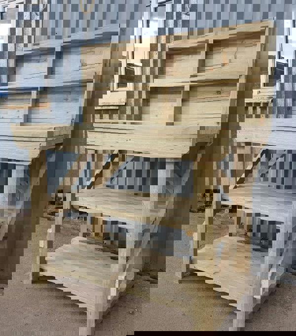 Indoor/Outdoor Pressure-Treated Double Shelf with back panel Workbench, a robust and versatile solution for all your workspace needs. Handcrafted in the UK, this workbench is constructed from high-quality, pressure-treated timber, ensuring durability and resistance to the elements, making it suitable for both indoor and outdoor use.