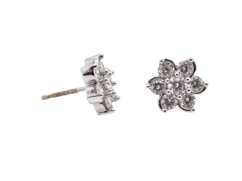 Vintage Tom A pair of diamond cluster earrings