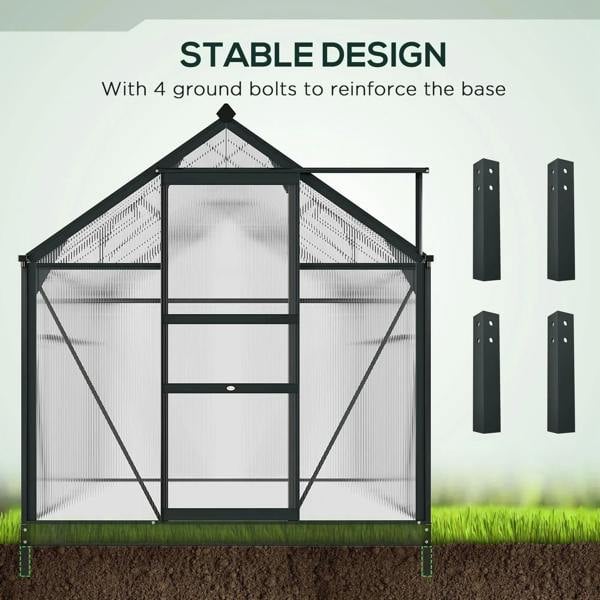 Grey greenhouse with clear polycarbonate walls and reinforced base with ground bolt mounts