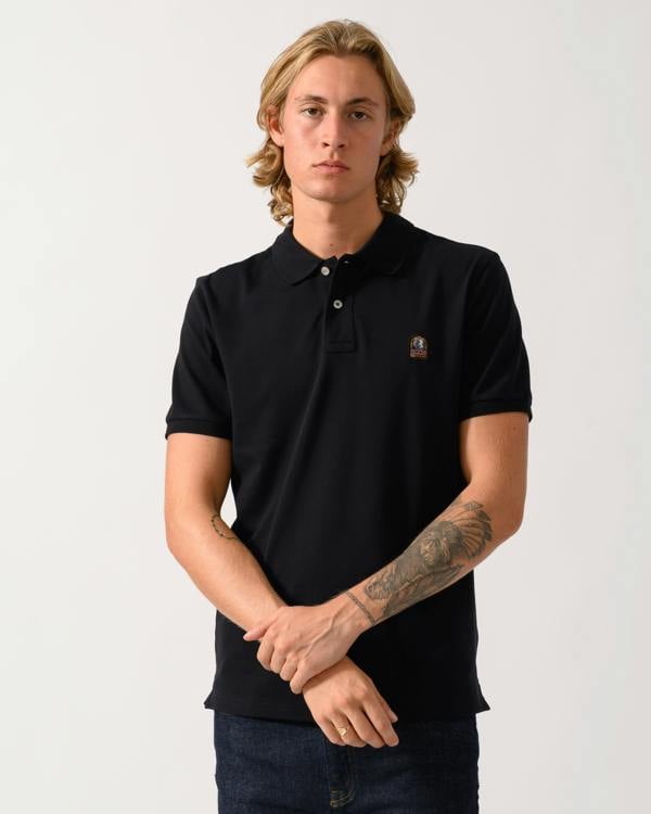 model wearing Parajumpers Wellington Mens Short Sleeve Polo in Black 541
