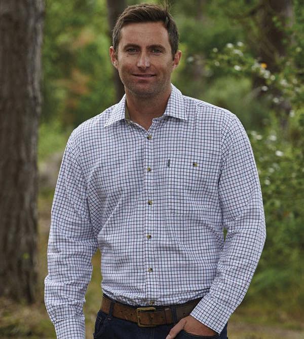 Champion Ayr shirt in blue check pattern, buttoned and laid flat with long sleeves, designed for smart casual rural wear
