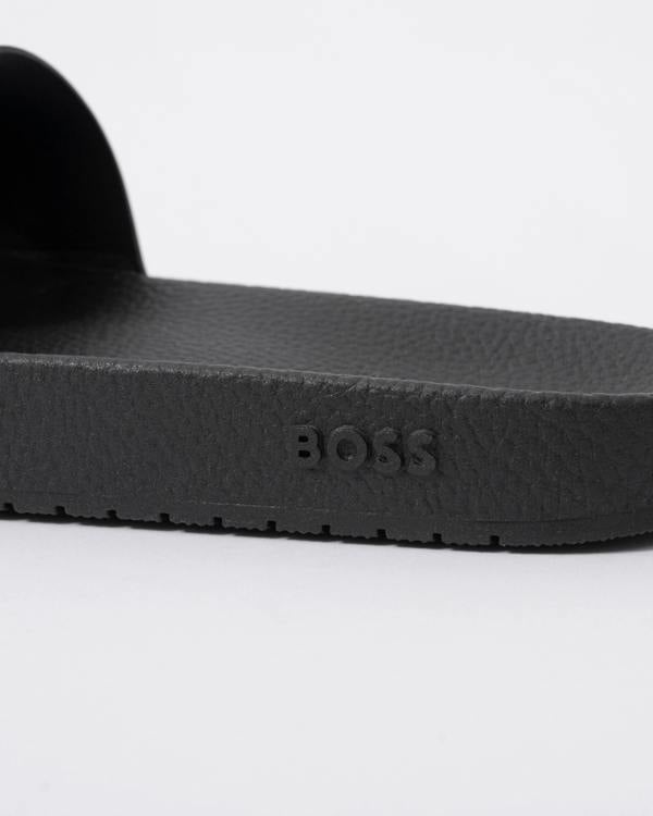 detail of BOSS Orange Aryeh Mens Italian-Made Slides With Large Logo Detail in Open Brown 248