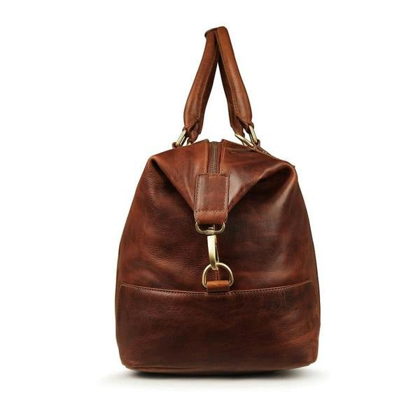 Side view of Orion tan leather holdall travel bag by Primehide showing reinforced seams and strap attachment.
