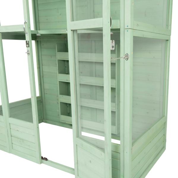 Victorian greenhouse in soft green wood, featuring glass panels, multiple shelves, and a hinged door for easy access