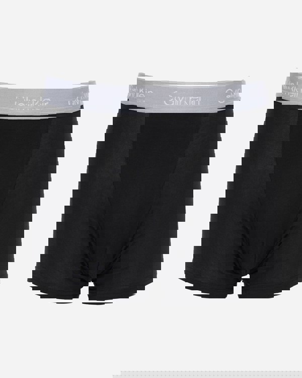 studio shot of Calvin Klein 3 Pack Icon Cotton Stretch Mens Relaxed Fit Trunks in Black with silver waistband
