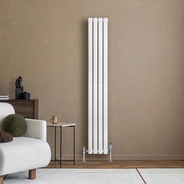 Sleek white oval single column radiator, 1600 x 240mm, mounted on a textured wall, complementing modern living room decor