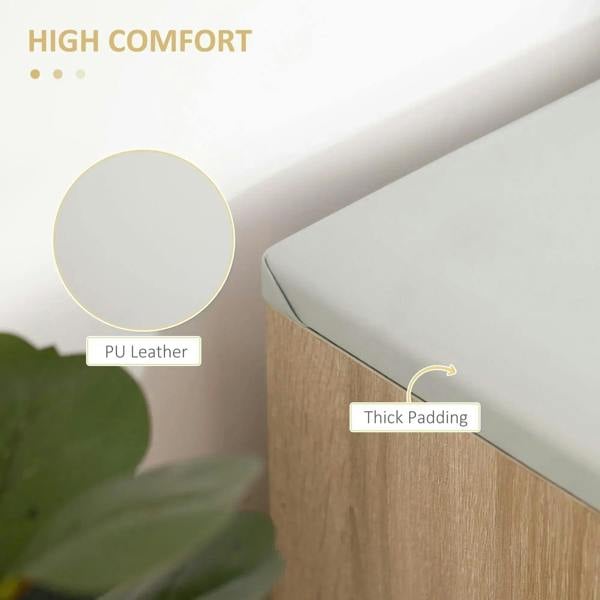 Oak-tone bench with thick padded white seat cover and hinged storage lid edge