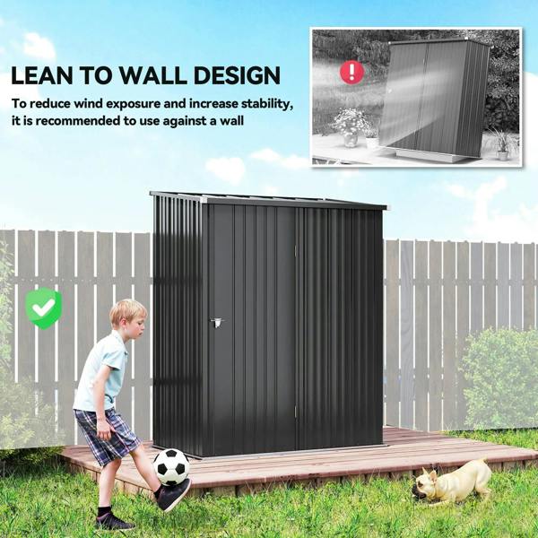Black corrugated steel shed with front latch door, designed for wall placement